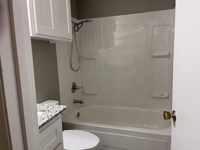 full bathroom featuring toilet, vanity, and bathing tub / shower combination