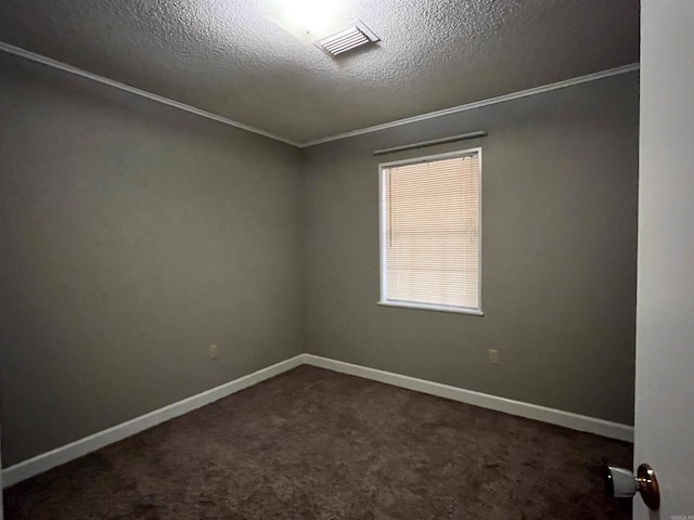 carpeted empty room with crown molding and a textured ceiling