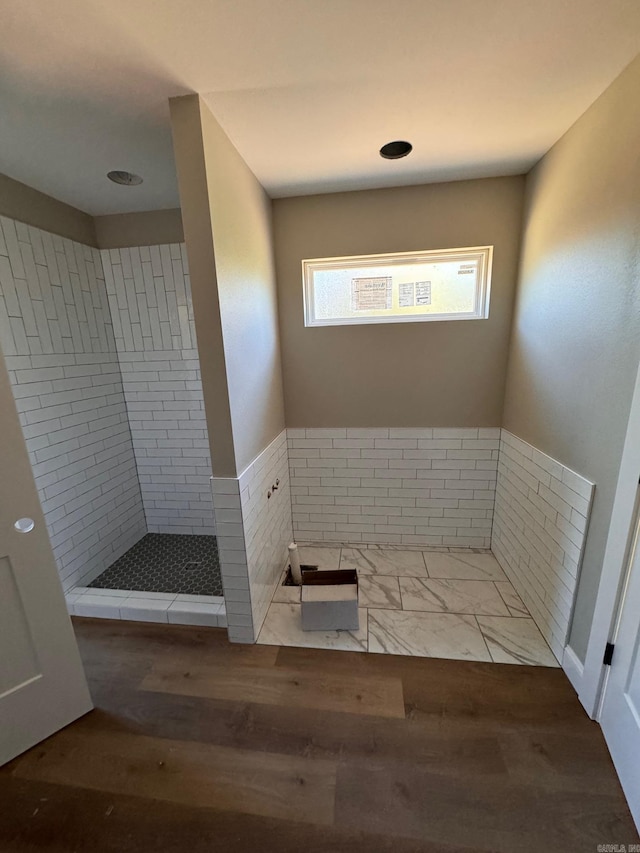 bathroom with wood-type flooring