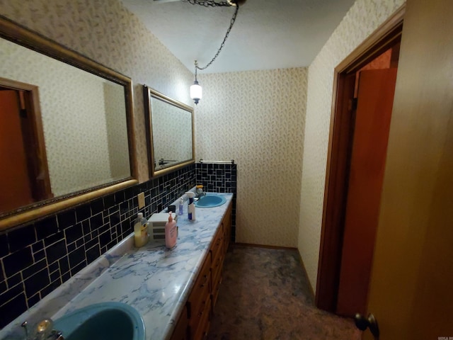 bathroom with vanity and backsplash