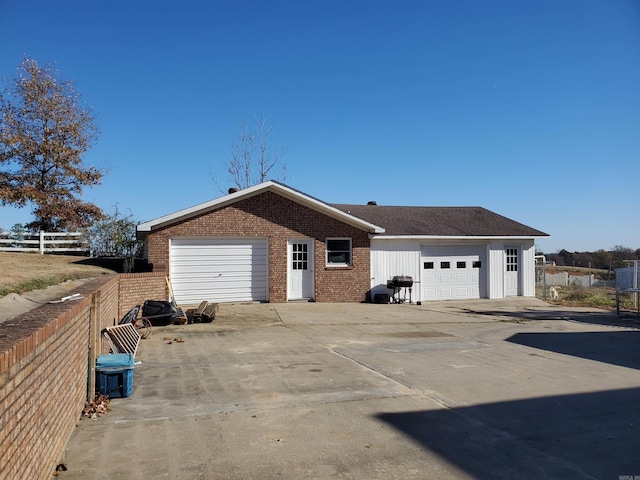 exterior space with a garage