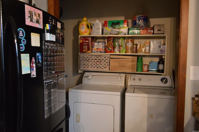 laundry area with laundry area and independent washer and dryer