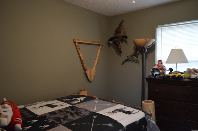 bedroom with a textured ceiling