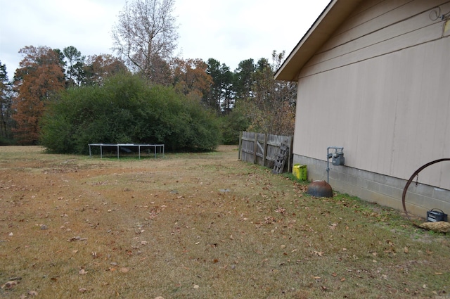 view of yard with a trampoline