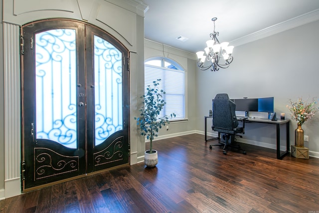 foyer with crown molding, french doors, wood-type flooring, and an inviting chandelier