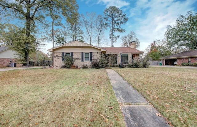 ranch-style home with a front lawn