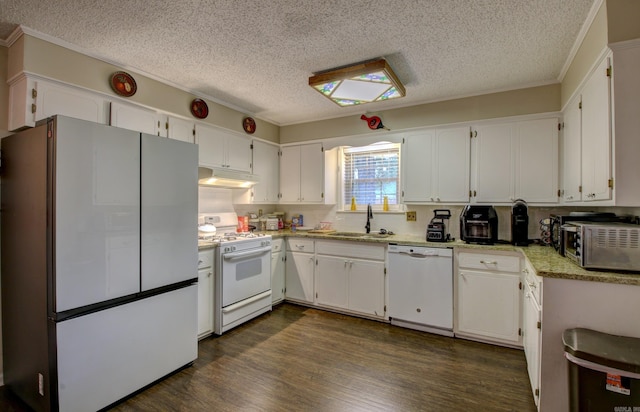 kitchen featuring a textured ceiling, white appliances, dark wood-type flooring, sink, and white cabinets