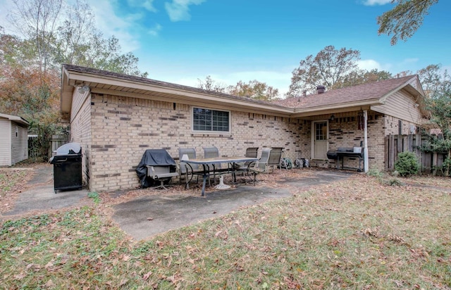 back of house featuring a patio