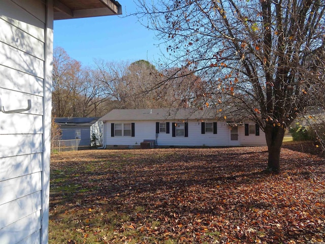 view of front of property with central air condition unit