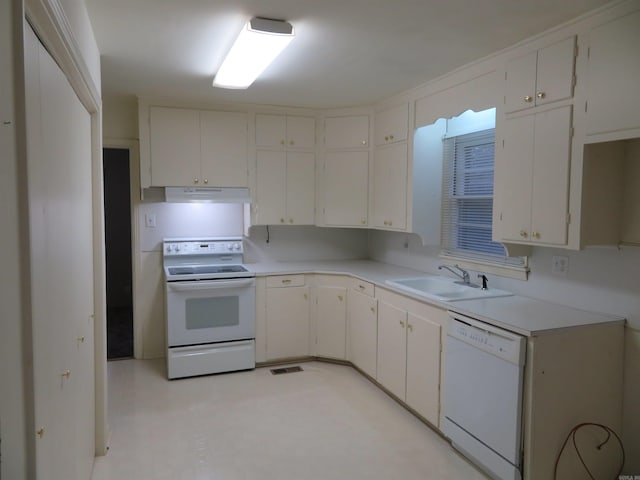 kitchen featuring white cabinetry, white appliances, and sink