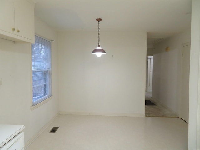 view of unfurnished dining area