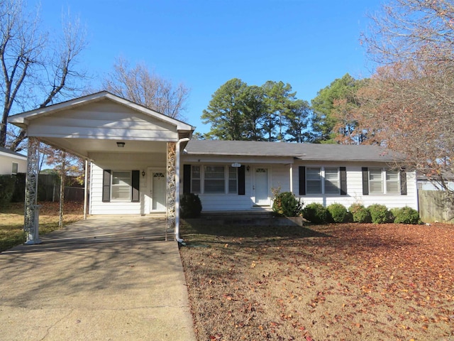 ranch-style home with a carport