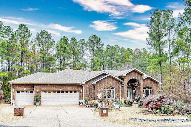 ranch-style home with a garage