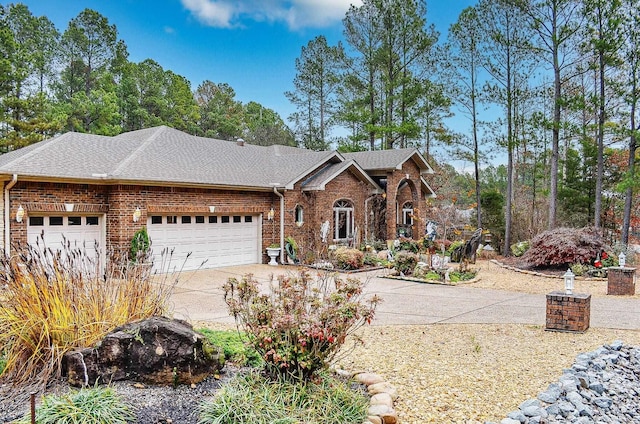 ranch-style house featuring a garage