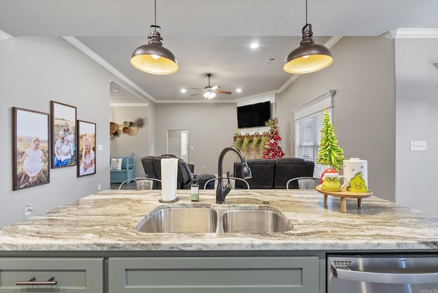 kitchen featuring ceiling fan, gray cabinets, ornamental molding, and sink