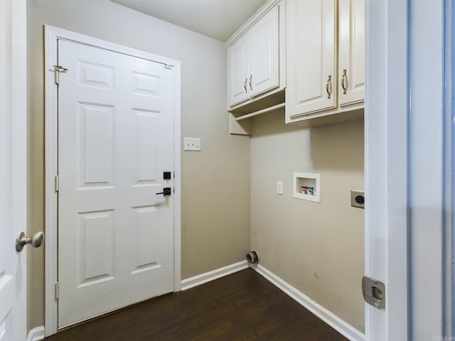 laundry room featuring washer hookup, electric dryer hookup, dark hardwood / wood-style floors, and cabinets