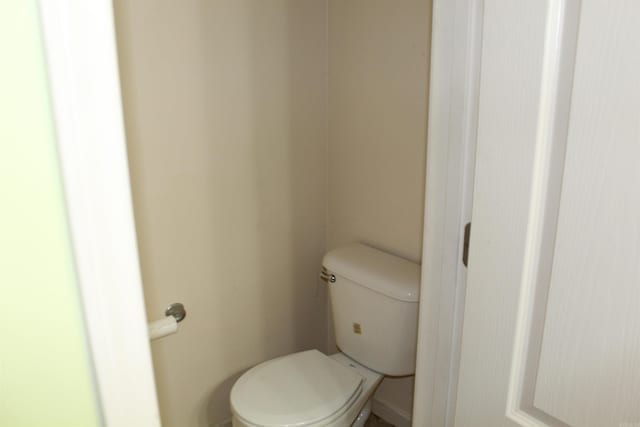 bathroom featuring toilet