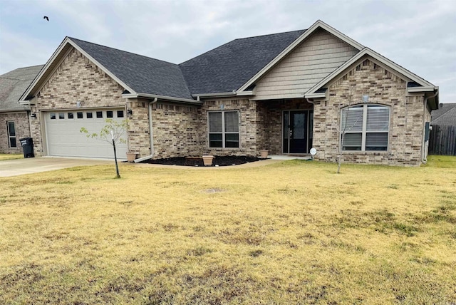 craftsman-style home with a front yard and a garage