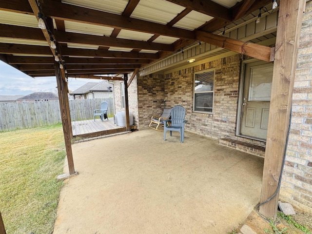 view of patio with a wooden deck