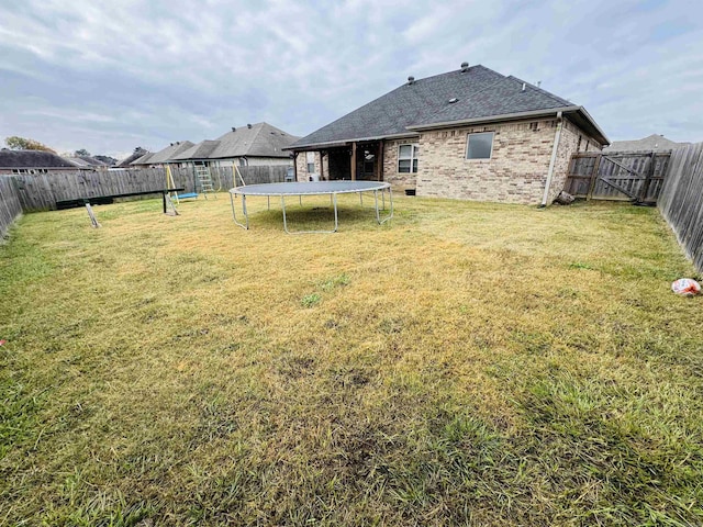 view of yard featuring a trampoline