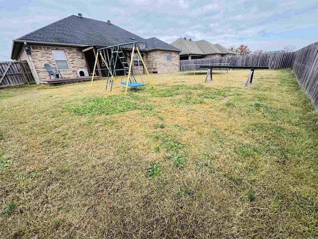 view of yard with a playground