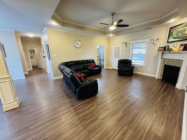 living room featuring dark hardwood / wood-style floors and ornamental molding