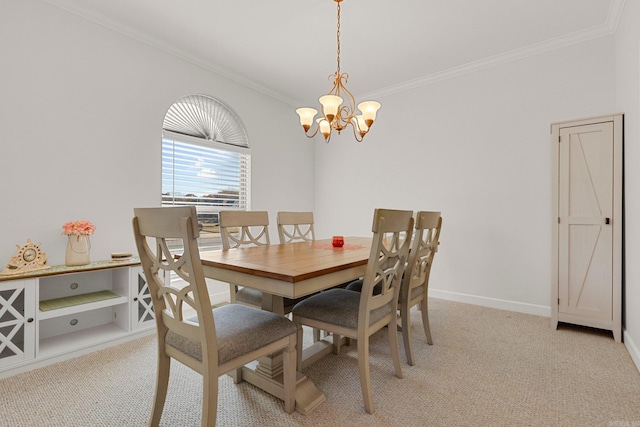 dining area featuring crown molding, light colored carpet, and a notable chandelier