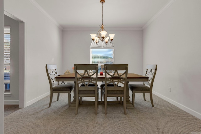 carpeted dining space with crown molding and a notable chandelier