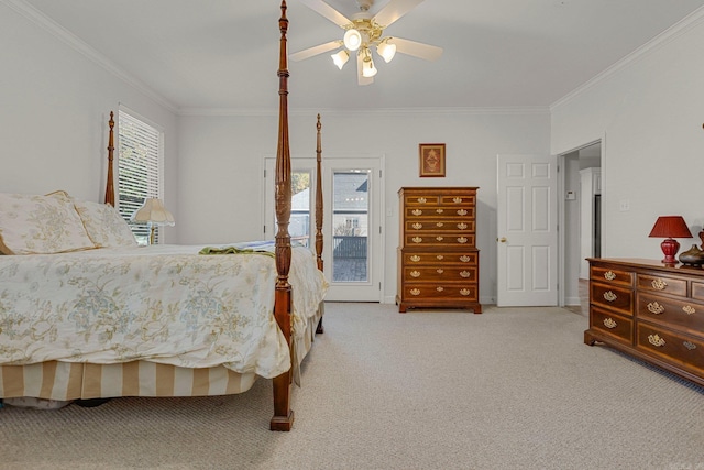 carpeted bedroom featuring access to exterior, ceiling fan, and crown molding