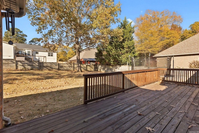 wooden terrace featuring a trampoline