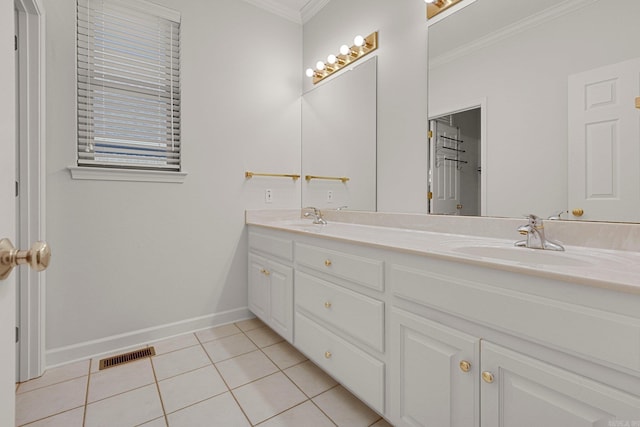 bathroom featuring tile patterned flooring, vanity, and ornamental molding