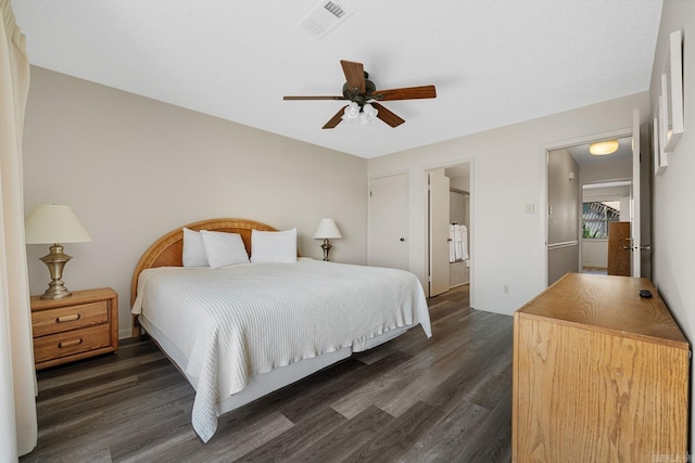 bedroom featuring dark hardwood / wood-style flooring and ceiling fan