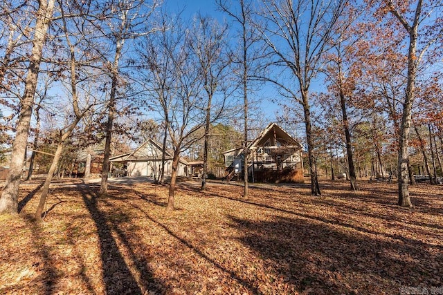 view of yard with a wooden deck