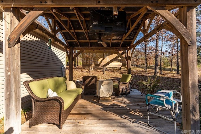 deck featuring a gazebo and an outdoor hangout area