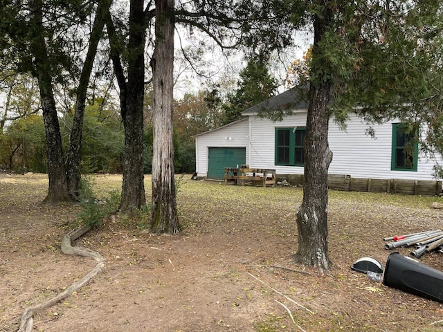 exterior space with a garage