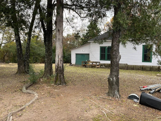 307 N 4th St, Benton, AR 71015 - view of yard featuring an attached garage