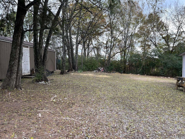 307 N 4th St, Benton, AR 71015 - view of yard with a shed