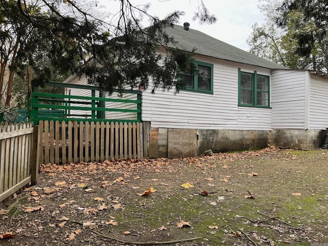 307 N 4th St, Benton, AR 71015 - view of property exterior featuring roof with shingles