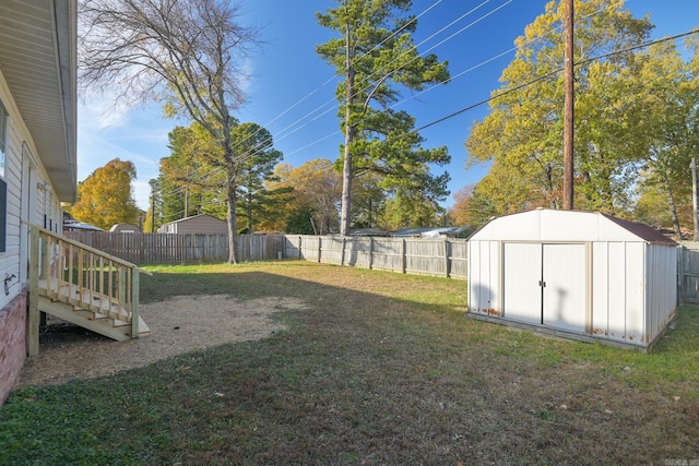 view of yard with a storage unit