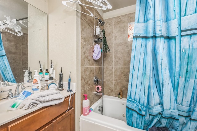 bathroom with shower / bath combination with curtain and vanity