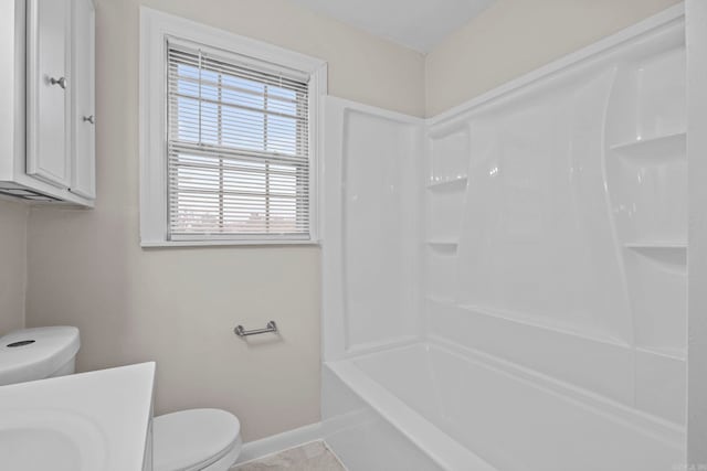 full bathroom with shower / bathing tub combination, vanity, toilet, and tile patterned flooring