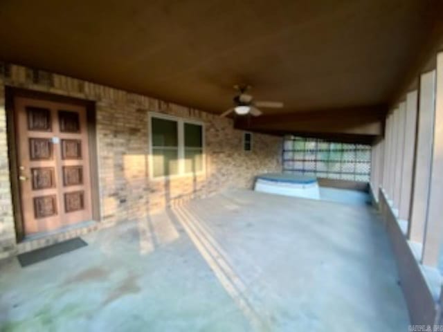 view of patio with ceiling fan