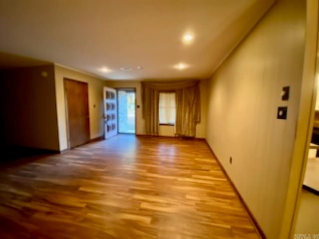 spare room featuring hardwood / wood-style flooring