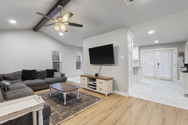 living room featuring ceiling fan, french doors, lofted ceiling with beams, and light wood-type flooring