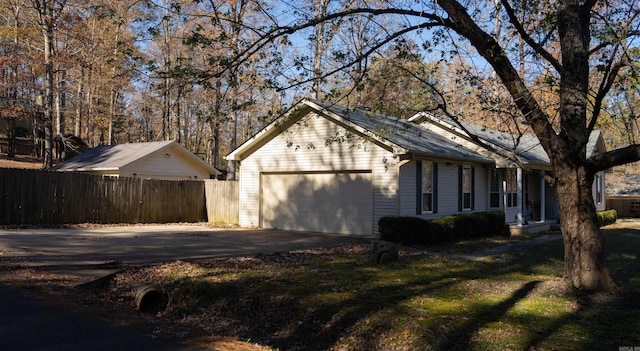 view of home's exterior with a garage