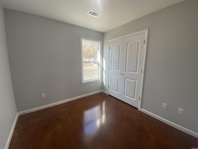 unfurnished bedroom with a closet