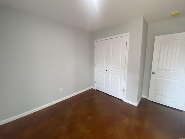 unfurnished bedroom with a closet