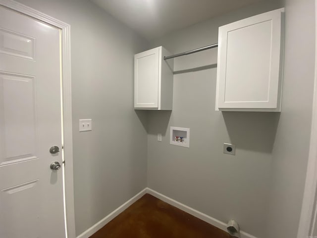 clothes washing area featuring electric dryer hookup, cabinets, and hookup for a washing machine