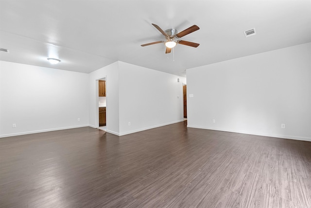 interior space featuring ceiling fan and dark wood-type flooring