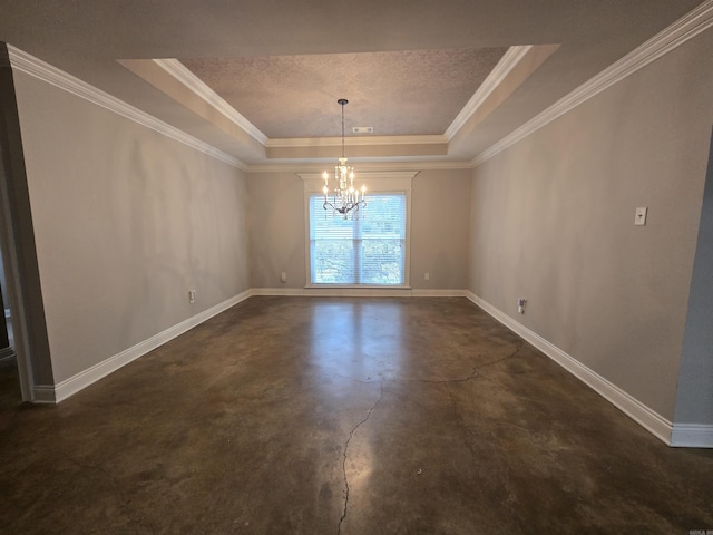 unfurnished dining area with ornamental molding, a tray ceiling, and a notable chandelier